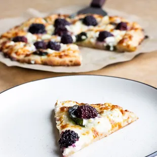 Gluten Free Honey Blackberry: extra virgin olive oil, fresh basil, mozzarella, goat cheese, parmesan, sea salt, blackberries and raw honey.
