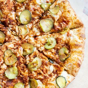 Nashville Hot Honey Chicken pizza, topped with pickles!