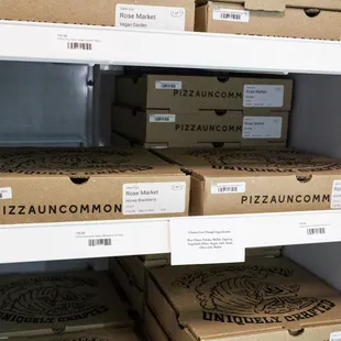 Frozen dough and pizzas (original, gluten free, and vegan) available at Rose Market in downtown Lafayette.