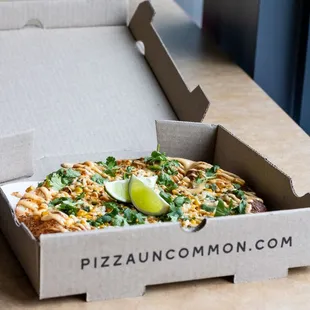 Order online at pizzauncommon.com [Pictured: Elote Pizza]