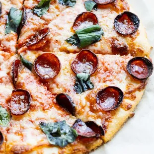 Gluten Free Hot Honey Pepperoni, topped with farm-fresh basil