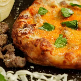 Vodka Sausage: creamy vodka sauce, homemade sausage, fresh basil, fresh parmesan.