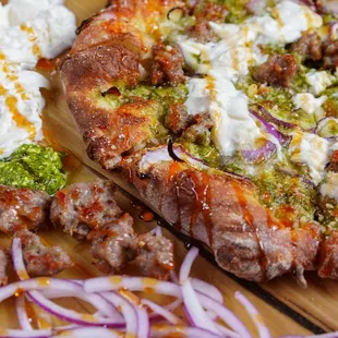 Sausage Burrata &amp; Pesto: basil pesto, mozzarella, homemade sausage, onion, parmesan, burrata, hot honey.