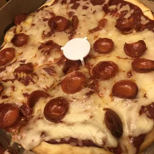 a pepperoni pizza in a box