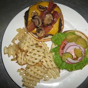 bacon cheeseburger with mushrooms and waffle fries