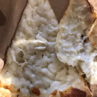 This is what you actually get for a crab Rangoon pizza, cheese pizza with two slivers of crab. Only crab on the whole pizza.