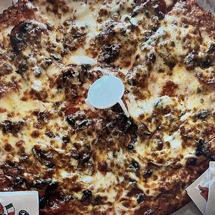 Pizza Zone N Grill's pepperoni and mushroom pizza.