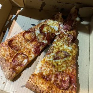 One slice of pepperoni cut into 2 pieces.