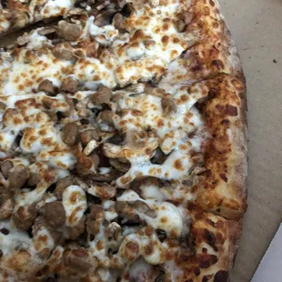 Mushrooms, beef , and a lot of cheese ,good!