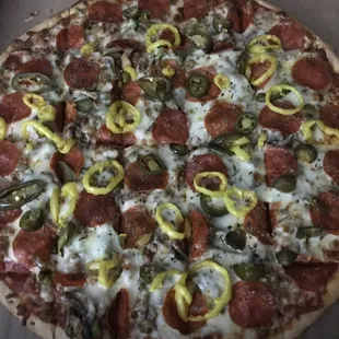 Supreme with jalapeño and banana peppers.