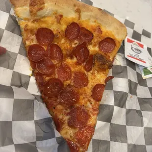 Pepperoni pizza slice