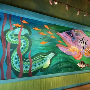 a mural in a restaurant