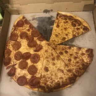 Half plain, half pepperoni thin crust. Soo greasy it made my stomach uneasy after eating it.
