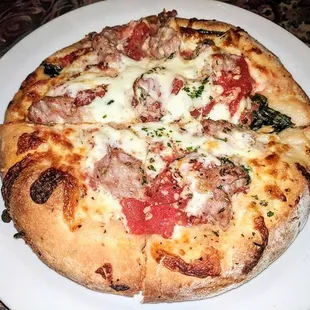 Margherita pizza with sausage.