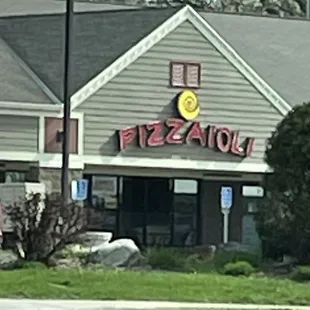 a car parked in front of a restaurant