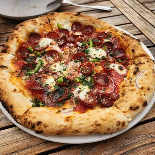 Tomato sauce, pepperoni, jalapeno, and spicy honey ($27)