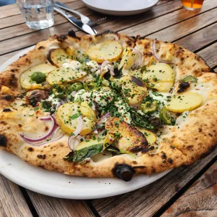 New potato, basil, green olives, and fontina ($26)