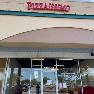 the front entrance of a restaurant