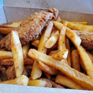 Chicken tenders with fries.