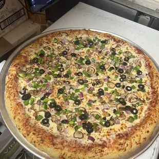 Delicious pizza with generous toppings and portions