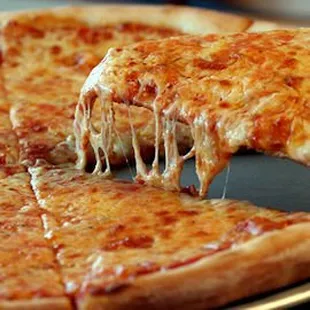 a slice being taken out of a pizza