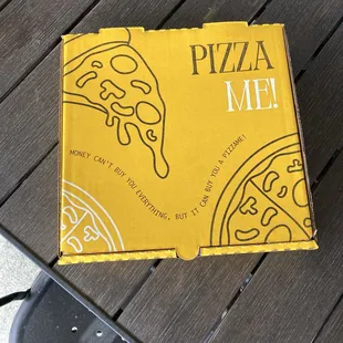 view of the pizza box containing my pizza