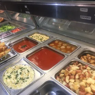 a buffet with many different types of food
