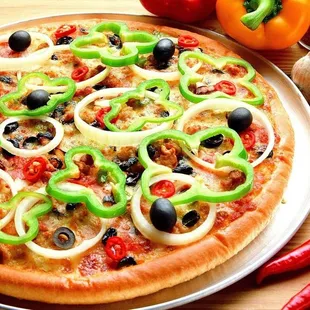 a pizza with olives and peppers