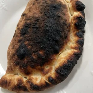 Burnt to a crisp in a bad way. Yuck.