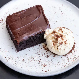 a chocolate cake and ice cream