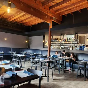 Dinning area open concept and rustic beams