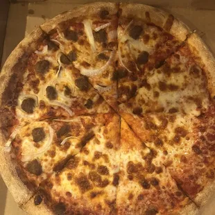 a pizza in a cardboard box
