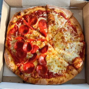 Small 8-cut half plain half pepperoni pizza from The Pizzaria, Ford City PA.