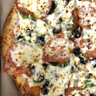a pizza in a pizza box