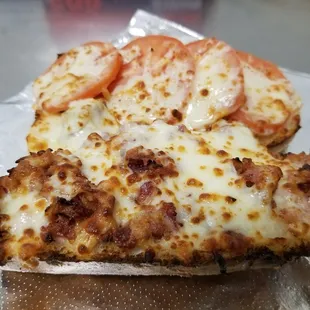 two slices of pizza on a plate