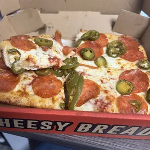 Pepperoni lunch special with jalapeños.