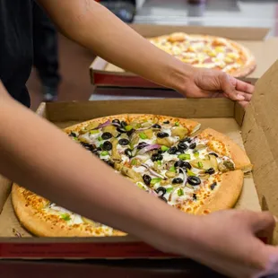 Get your serving of veggies with our Veggie pizza! - Mushrooms, Green Peppers, Onions, Black Olives, Tomatoes, and Italian Herbs $11.99