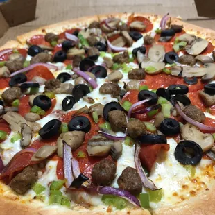 Perfectly baked combo pizza.