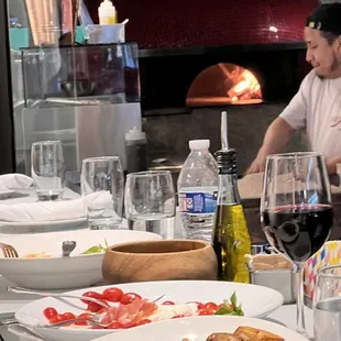 a chef preparing a meal in a restaurant