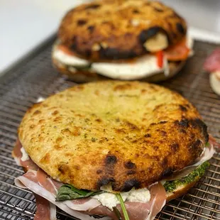 two sandwiches on a wire rack