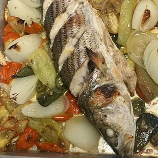 Today&apos;s catch Mediterranean style serves with salad and toasted bread. Special order!