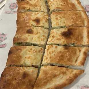 Chicken Broccoli Alfredo calzone made by chef Tonny