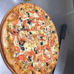 Pizzati Italian Classic! Try this signature pizza with special pesto sauce and ingredients! You won't find this anywhere :)