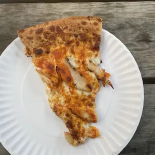 This is a slice of Buffalo chicken pizza it was delicious!