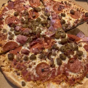 Medium meat lovers pizza