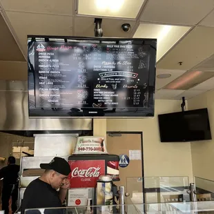 a man working behind the counter