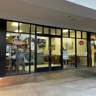 the entrance of a pizzeria restaurant