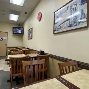 empty tables and chairs in a restaurant