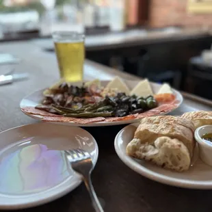 Amazing bread, appetizer plate, service, beer!