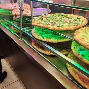 a variety of pizzas
